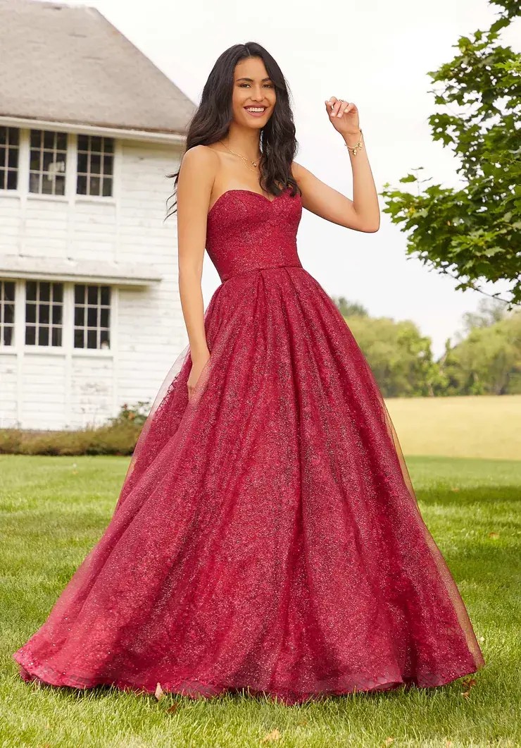 Photo of model in a red dress